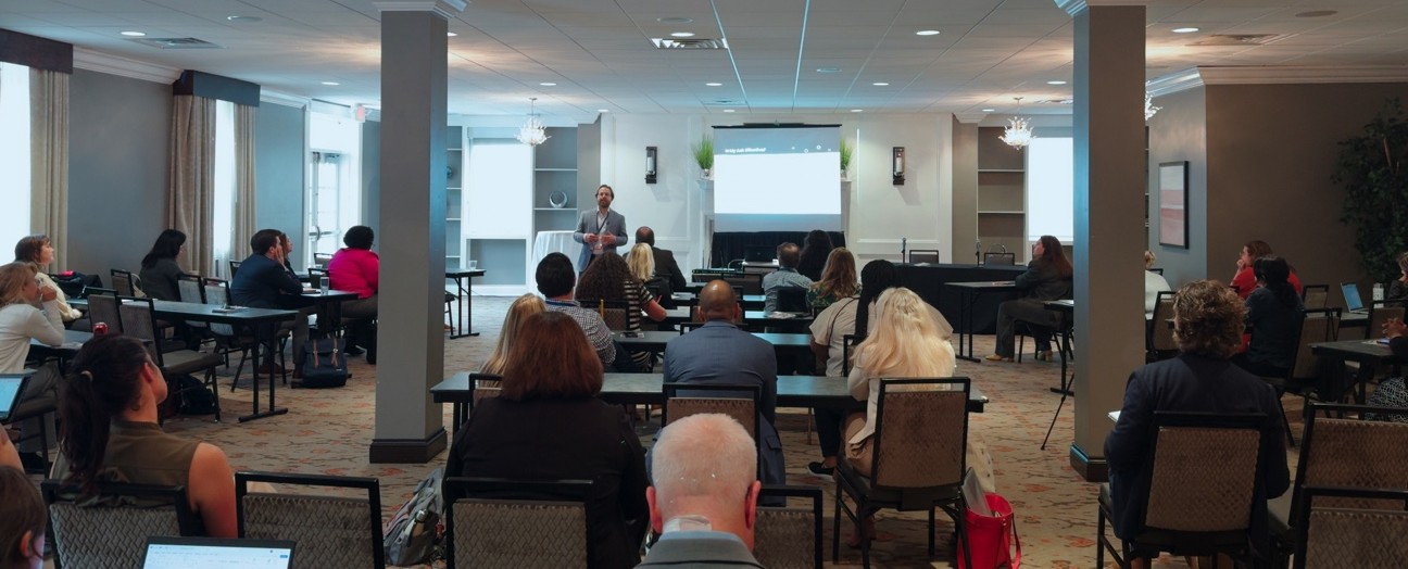 There was standing room only for Jesse's session, The Metrics You’re Missing - Building reports that actually drive change.